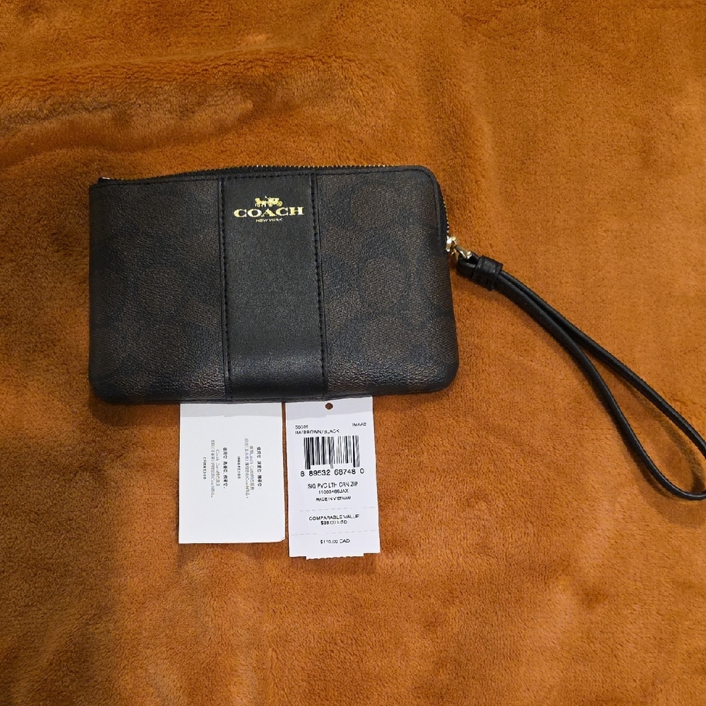 Deep Brown And Black Coach Wristlet. Brand New With Tags.